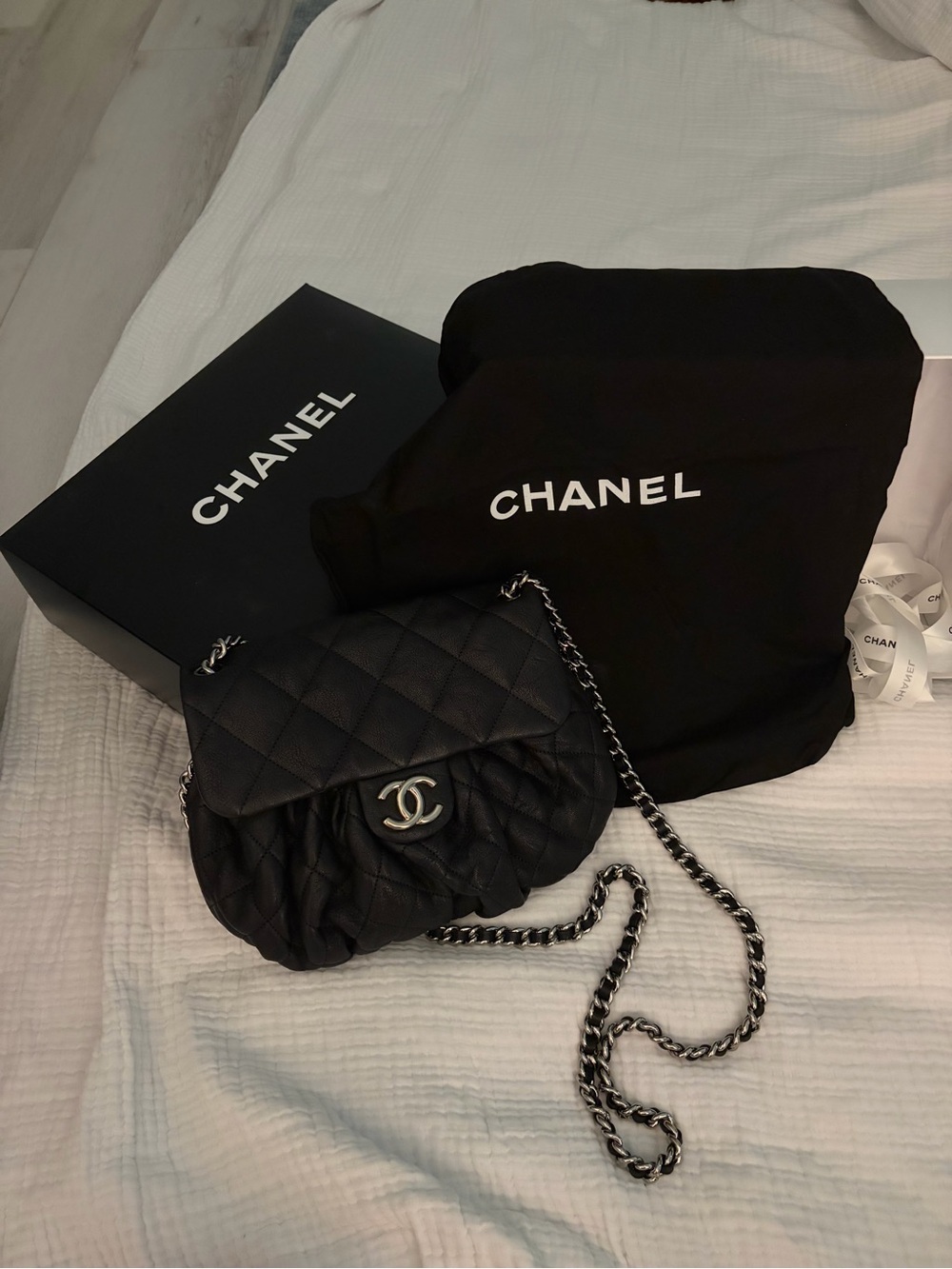 CHANEL Black Quilted Leather Small Flap Crossbody with Silver Chain